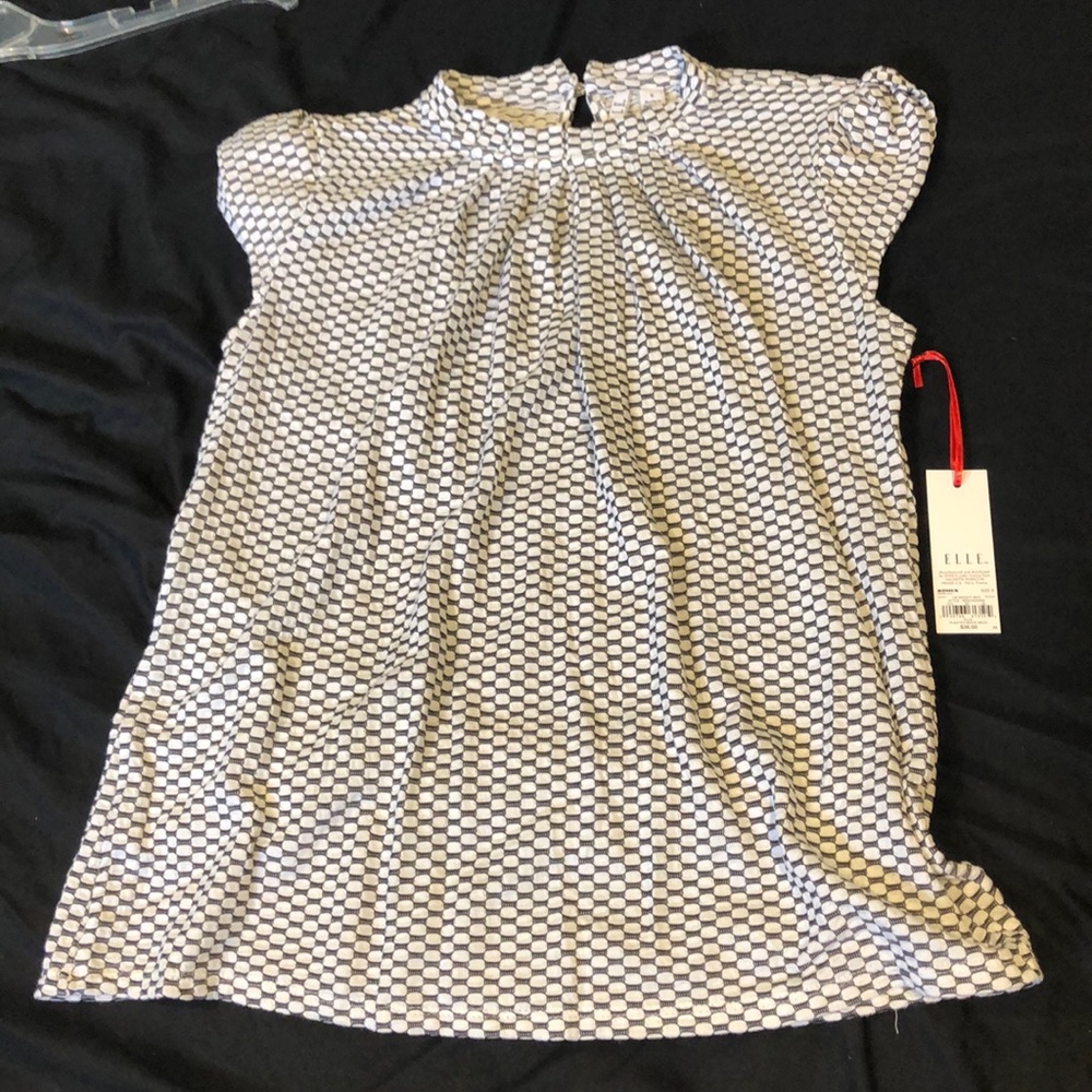 Super cute white and black blouse!